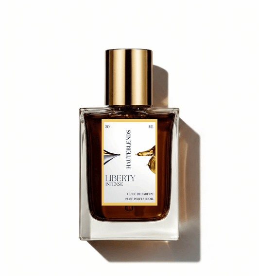 HauteBlends Liberty Intense pure perfume oil concentrate inspired by Libre Intense — 30ml Huile de Parfum fine fragrance in a rectangular clear glass bottle with a centered label and gold flat twist push dropper cap.